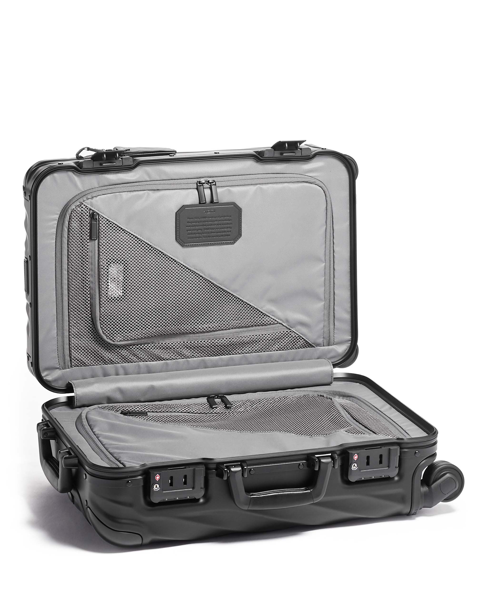 Tumi aluminum suitcase deals