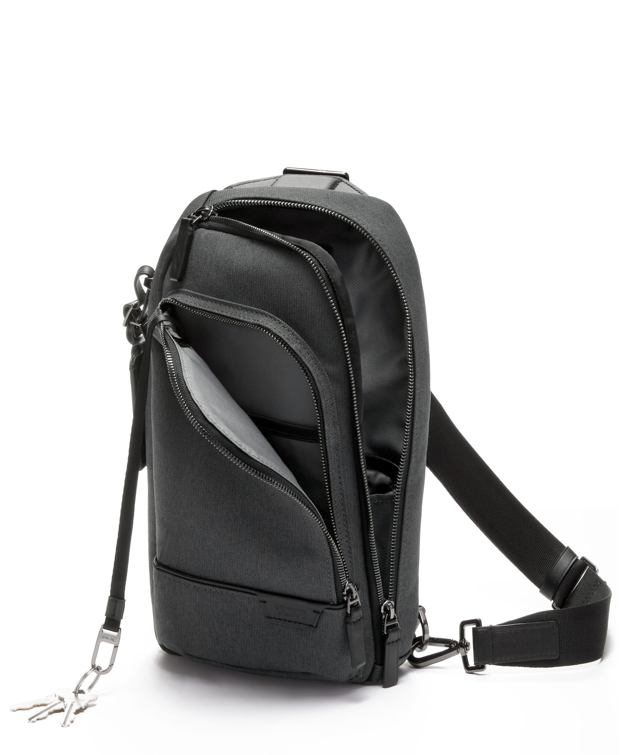 Tumi harrison deals sling